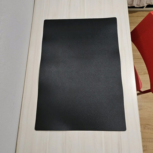 Desk mat used, black