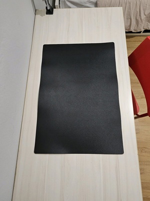 Desk mat used, black