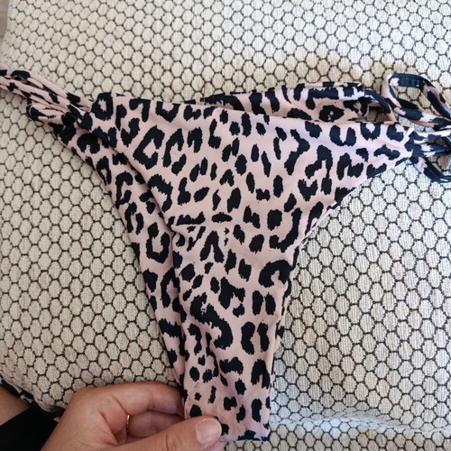Leopard print swimsuit S-M like new with cut bottom and good chest lining