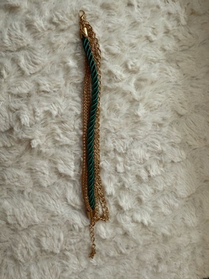 Steel bracelet new with green cord braided design