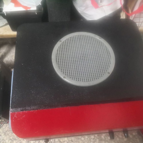 Red Garrard collectible pick up used with built-in speaker