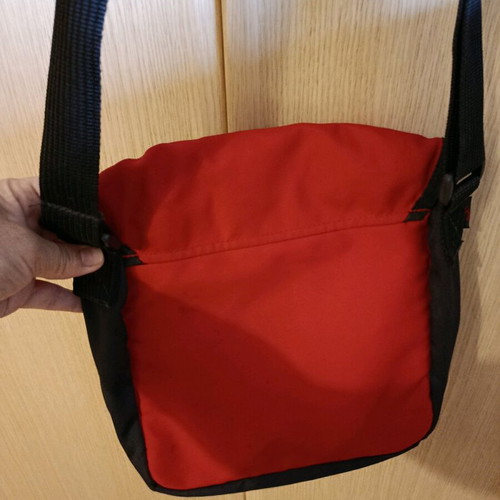 O'Neill crossbody bag used red with scratch and zipper pocket
