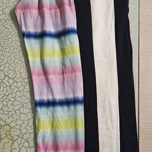 Girls' leggings set of 4 like new, ages 10-12