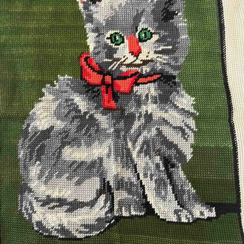 Handmade framed textile painting used with green background
