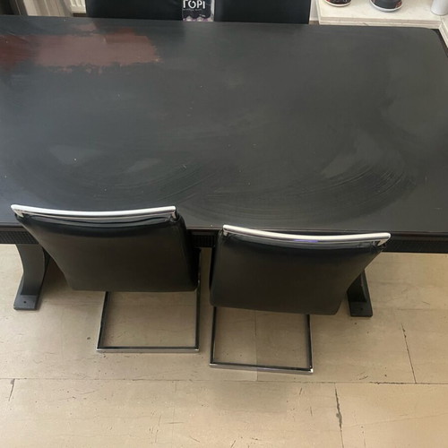 Table with four leather chairs used, heavy wood