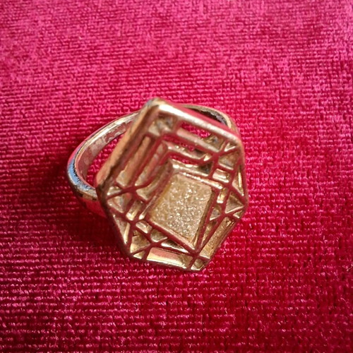 Hexagon ring used, gold color