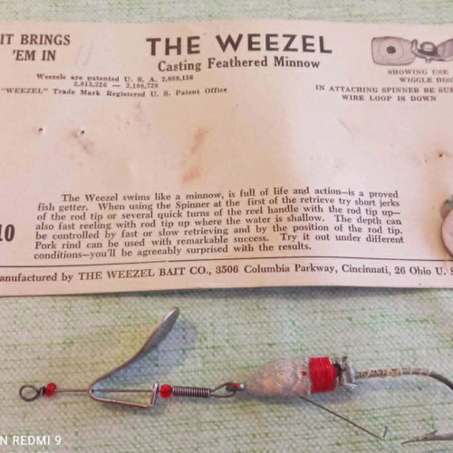 The Weezel Casting Feathered Minnow vintage fishing lure used