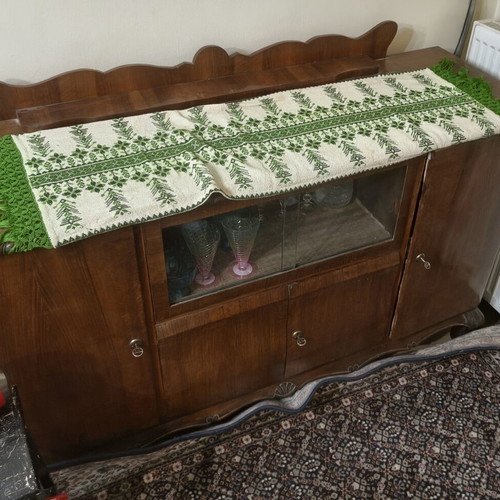 Vintage wooden sideboard with carved legs used