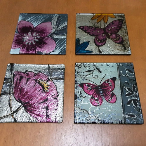 Glass coasters used, set of 4, butterfly and flower designs