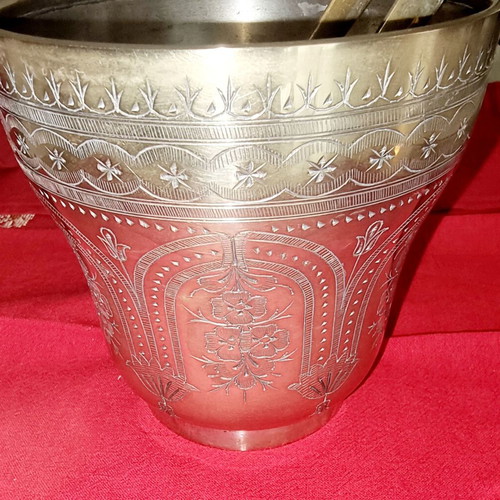 Silver-plated ice bucket like new with carved details and special handle
