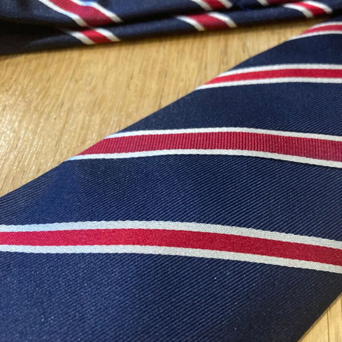 Silk tie new with matching box, blue and red