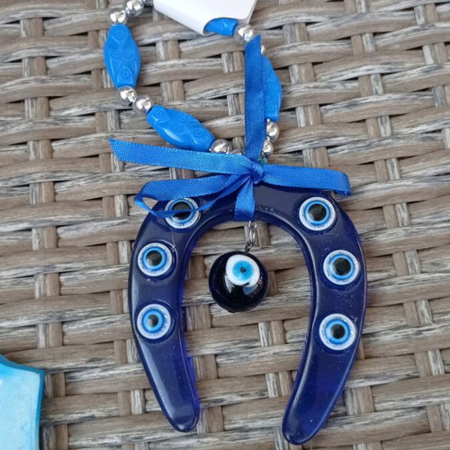 Wall decor new in blue tones with horseshoe and ceramic from Rhodes