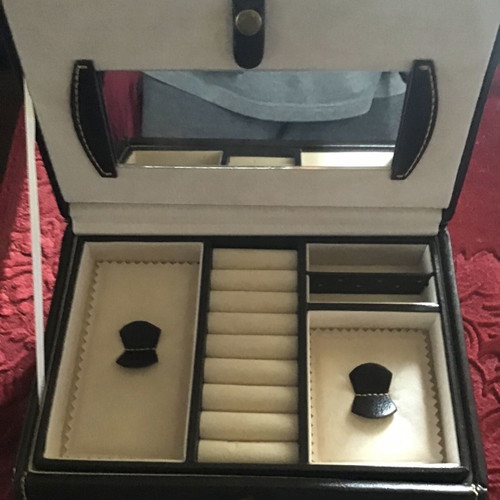 Jewelry box brown like new with leather exterior and velvet lining
