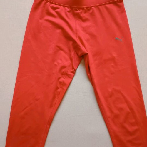 Puma women's 3/4 leggings like new, orange