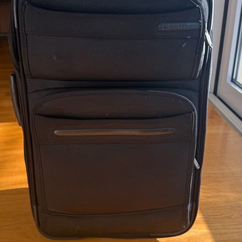Delsey suitcase used with wheels small size black