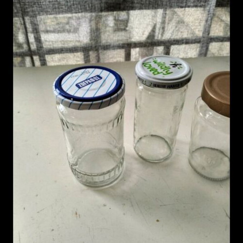 Glass jars like new, set of 4 for kitchen use