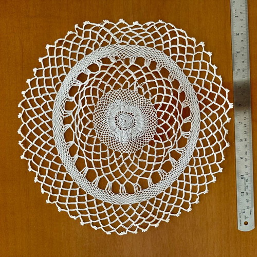 Handmade small doilies set of 9 like new
