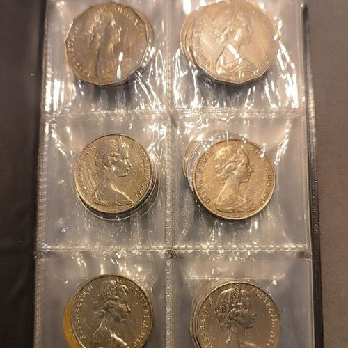 Album of 60 collectible coins