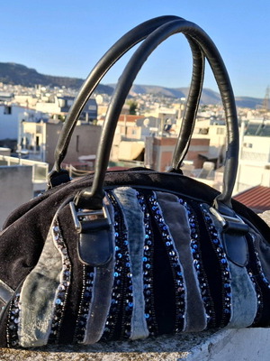 Vintage style black velvet handbag with sequins used