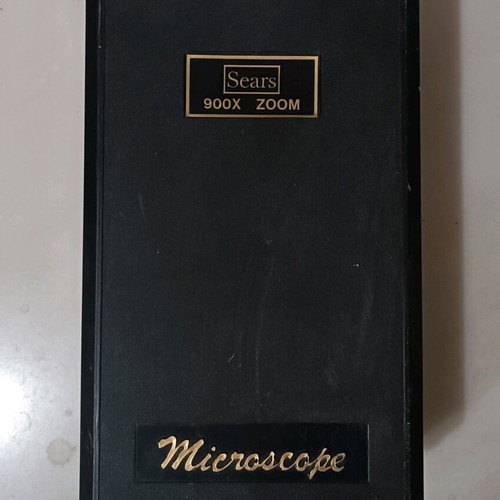Vintage metal microscope with case and accessories like new
