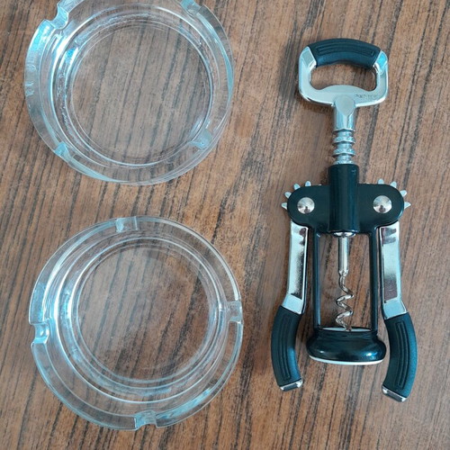 Household utensils like new, cutting board, corkscrew, ashtrays, silicone mold