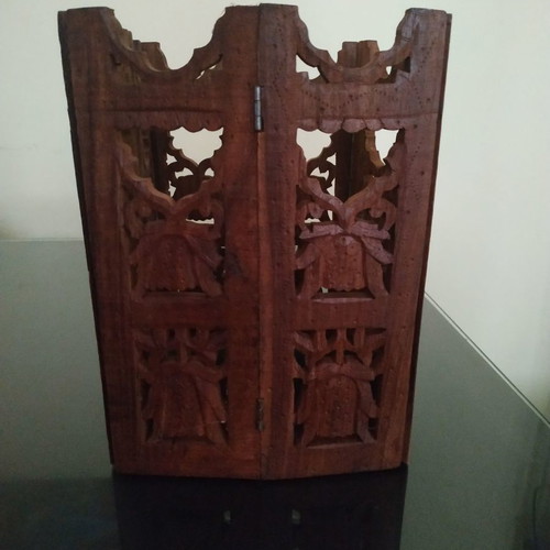 Wooden carved folding decorative item used