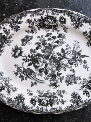 Antique platter used oval with rich decoration