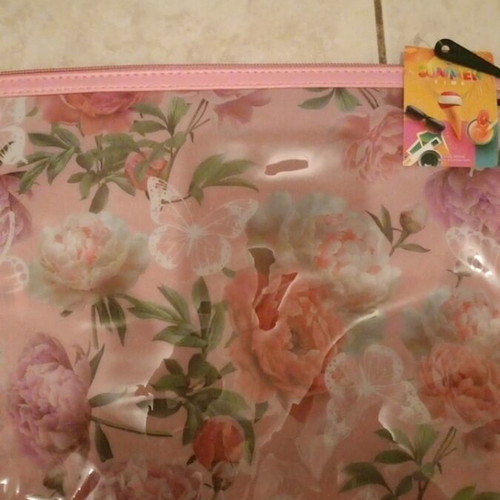Toiletry bag new, pink with zipper