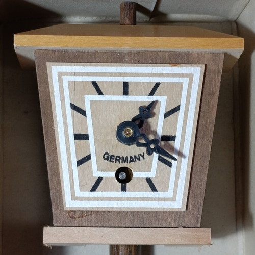 Vintage German mechanical table clock new, wood