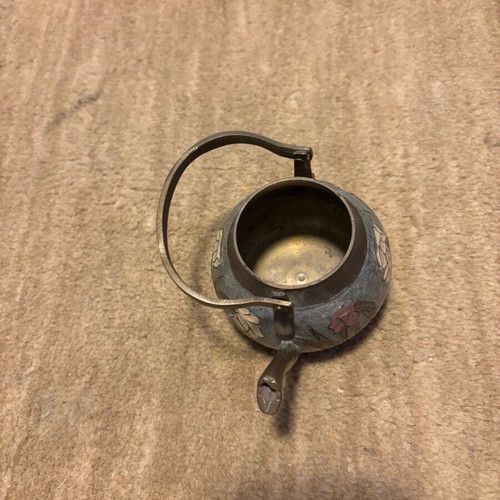 Handmade used brass decorative teapot with carved floral designs