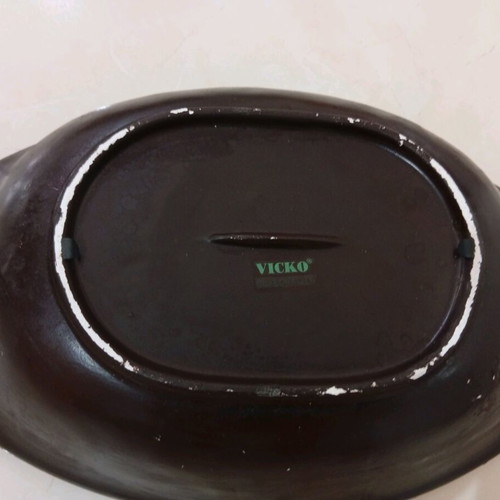 Decorative ceramic platter used with gold leaf and burgundy details