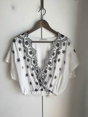 Zara wrap top size S like new with black and white cutout designs