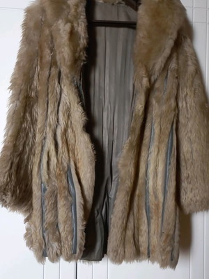 Fur used in excellent condition, gray, size M