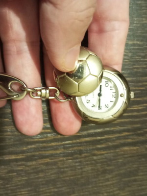 Keychain watch with openable football cover