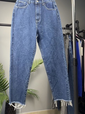 Women's blue classic faded mom jeans with raw hem