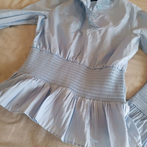 Blue shirt like new, size S with smocked waist and cuffs