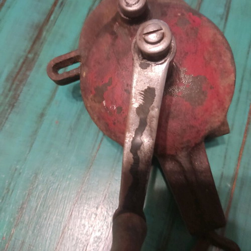 Old hand-operated grinding wheel used