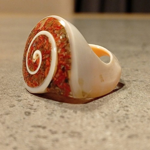 Bone ring with spiral design like new, orange
