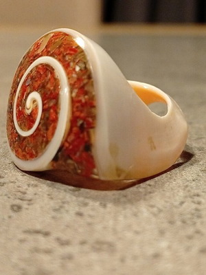 Bone ring with spiral design like new, orange