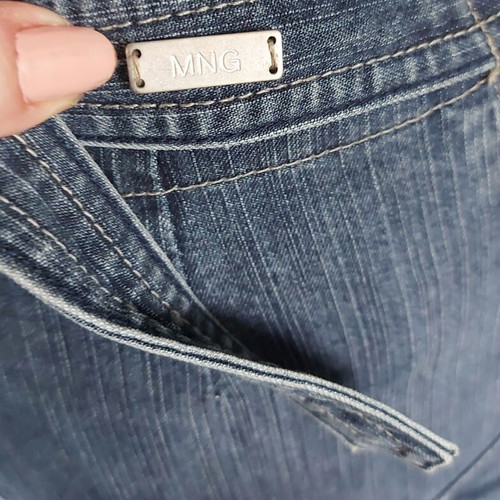 Φούστα denim Mango XS/S σαν καινούργια, ασύμμετρο σχέδιο με τσέπες