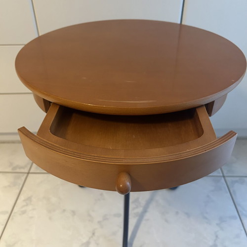Wooden nightstand used with metal base and drawer