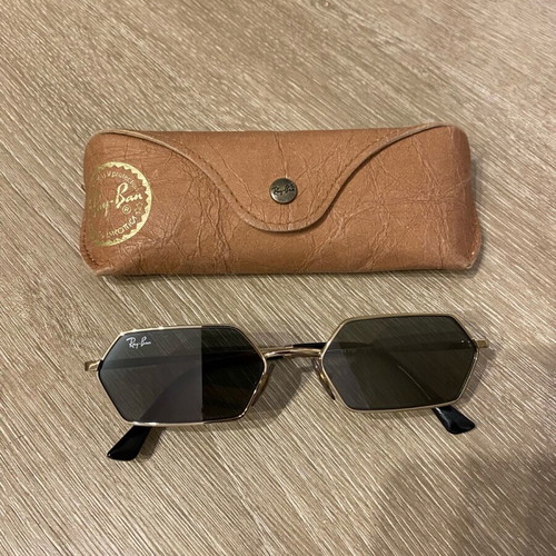 Ray Ban sunglasses like new, gold with unique shape