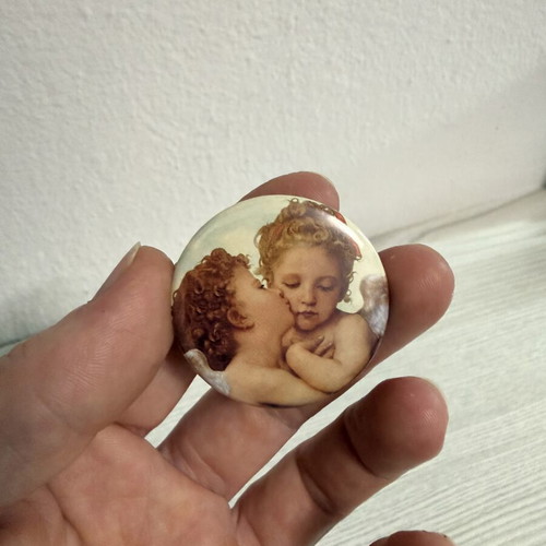 Pin with two angels from The First Kiss classic artwork