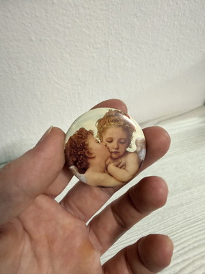 Pin with two angels from The First Kiss classic artwork