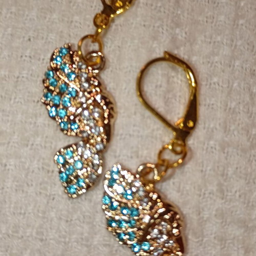 Angel Wings Earrings new with blue zirconia and yellow gold plating