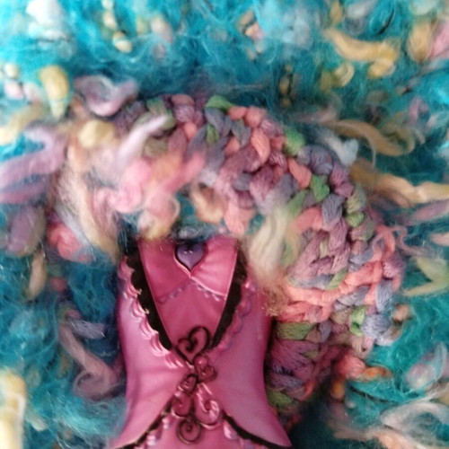 Doll with handmade dress and hat used