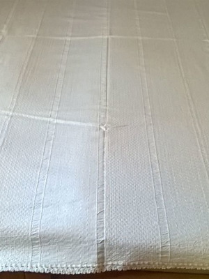 Cotton loom blanket used, thin with lace edging