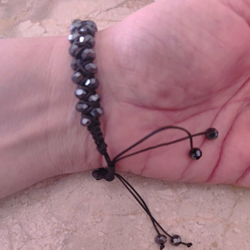 Macrame bracelet like new with black crystal beads