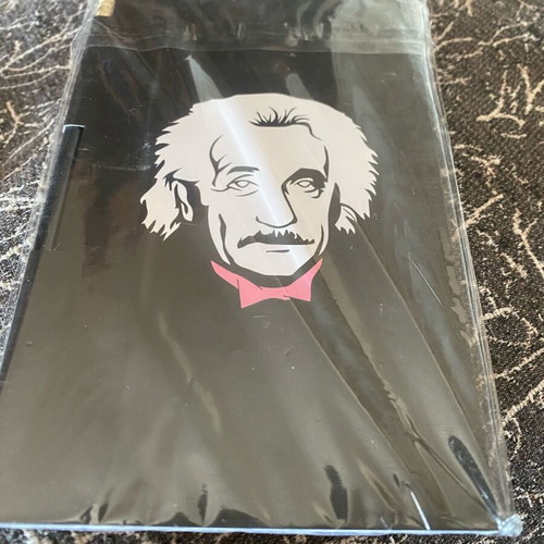 Notebook with Albert Einstein reference and pencil new