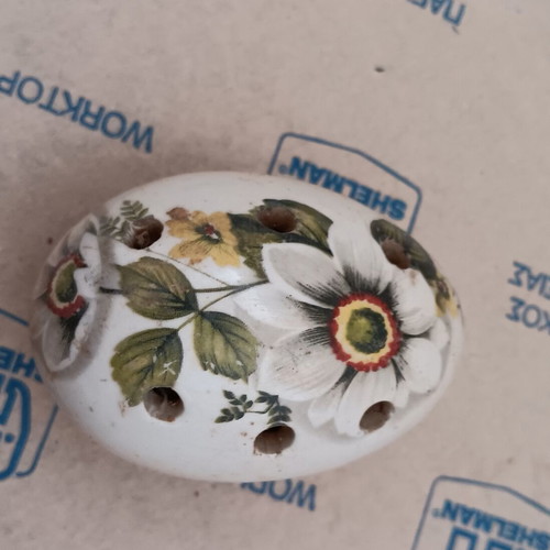 Ceramic incense stick holder egg-shaped used, floral design